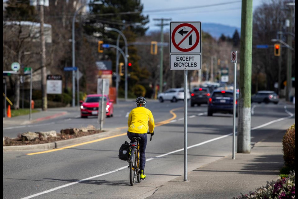 A cyclist rides in the existing bike lane on Fort Street near Chestnut Street in Victoria on Thursday, March 18, 2021. City councillors have endorsed designs for four new bike routes through the Jubilee, Oaklands and Fernwood neighbourhoods. DARREN STONE, TIMES COLONIST