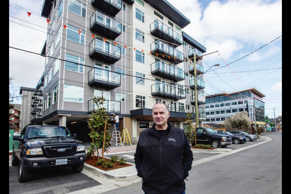 Saanich Coun. Colin Plant, who chairs the CRD board, at Hockley House in Langford, a six-storey rental building with 120 new affordable homes. DARREN STONE, TIMES COLONIST