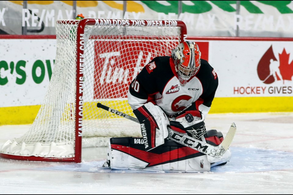 Prince George Cougars goalie Tyler Brennan makes one of his 43 saves on the way to his first career WHL shutout. Vancouver Giants goalie Trent Miner also earned a shutout and the victory as the Giants scored once in the shootout for a 1-0 WHL win Sunday in Kamloops.