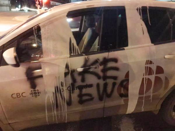 A vandal spray-painted 'Fake News' and dumped white paint on a CBC Kamloops vehicle in downtown Kamloops on April 4, 2021.
