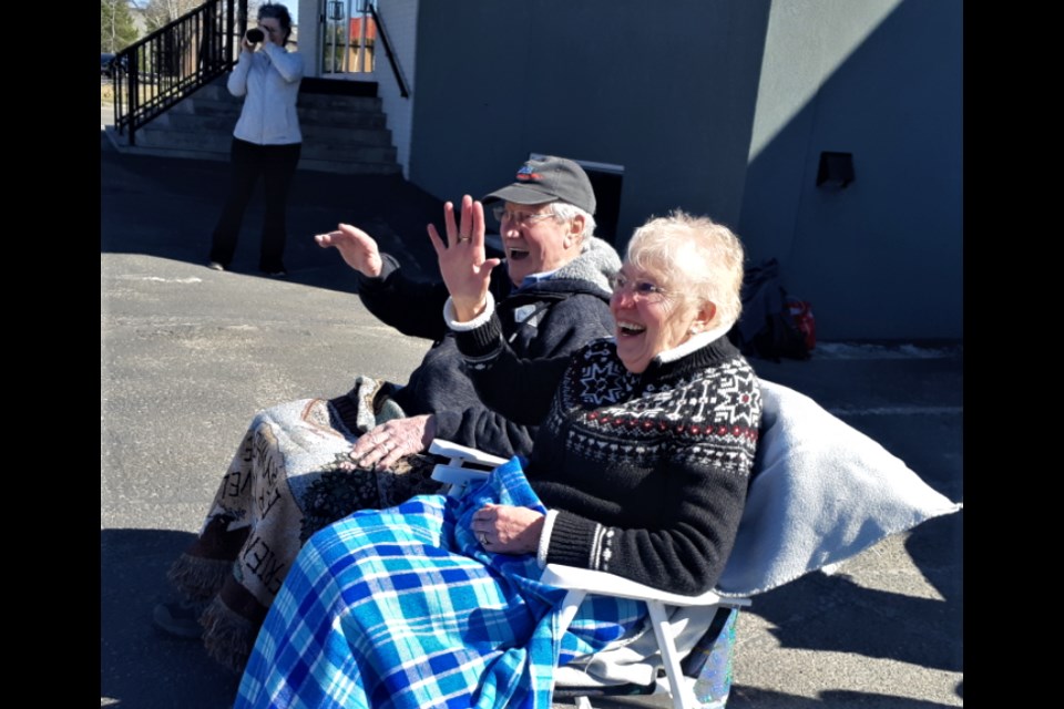 Ben and Russella Klassen are all smiles as they greet some of their friends at their farewell party Sunday at Lakewood Alliance Church. The Klassens, who owned and operated Homesteader Meats for 36 years, are moving to Vancouver Island.