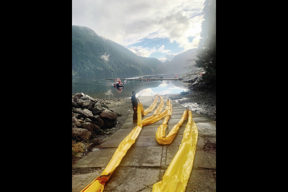 Boom deployed in Nootka Sound where a 50-year-old shipwreck is leaking oil.  CANADIAN COAST GUARD