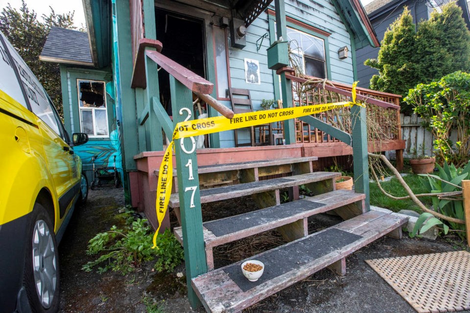 Scene of an early morning Cameron Street fire that left two cats dead on Friday.  DARREN STONE, TIMES COLONIST