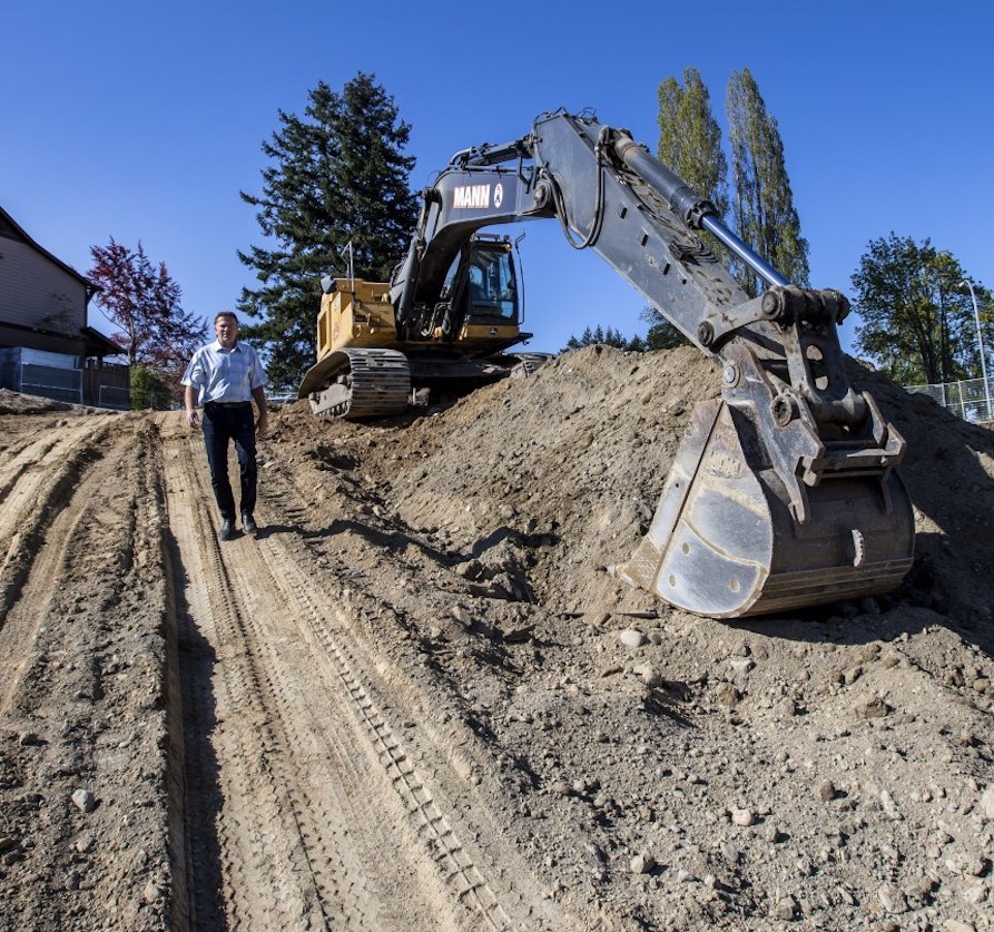 Monty Fitz of Don Mann Excavating: dirt problem pushed around. | Darren Stone, TC