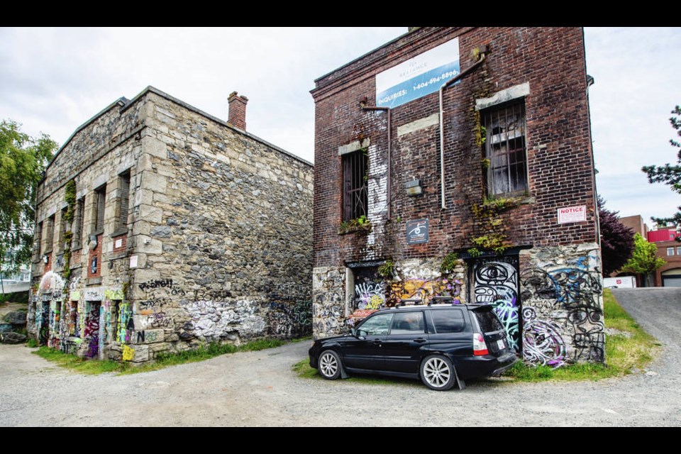 The Northern Junk buildings on Wharf Street. Reliance Properties wants to rehabilitate the two warehouses, which date to the 1860s, and incorporate them into a six-storey mixed-use building with commercial space, 47 rental units, an internal alleyway and waterfront walkway. DARREN STONE, TIMES COLONIST