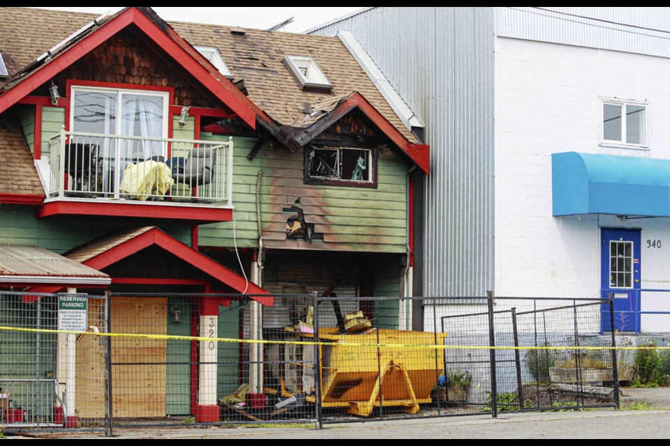 Aftermath of a Saturday fire in Vic West at 320 Mary St.: A tenant at a nearby recently opened shelter was arrested for arson. The man has lost his shelter space. ADRIAN LAM, TIMES COLONIST
