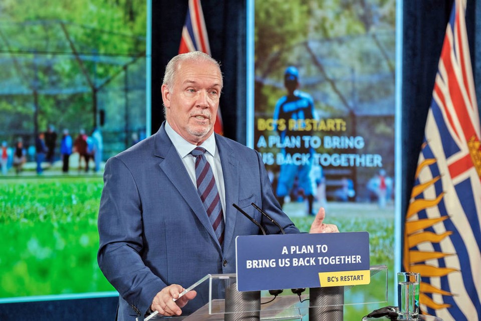 Premier John Horgan announces the transition into Step 2 of B.C.’s Restart plan, including lifting restrictions on travel within B.C., on Monday, June 14, 2021. PROVINCE OF BRITISH COLUMBIA