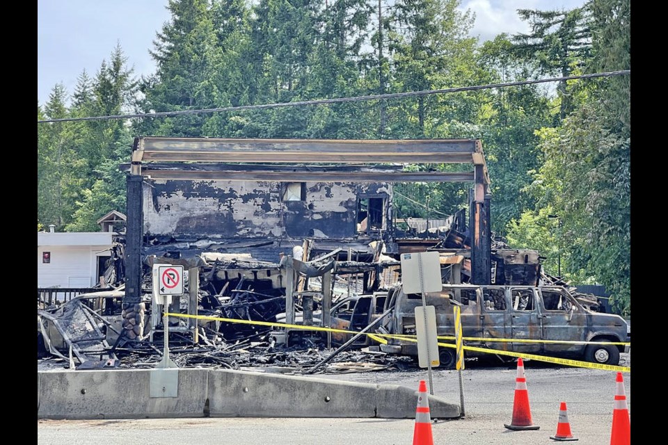 Firefighters returned to the Whiskey Creek Co-op gas station on Friday, a day after a vehicle fire spread to the building, causing significant damage to the two-storey structure. JAMES ANDERSEN