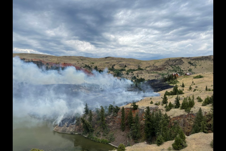 The Napier Lake wildfire is burning about four kilometres northeast of Stump Lake as of 6 p.m. on July 7, 2021.