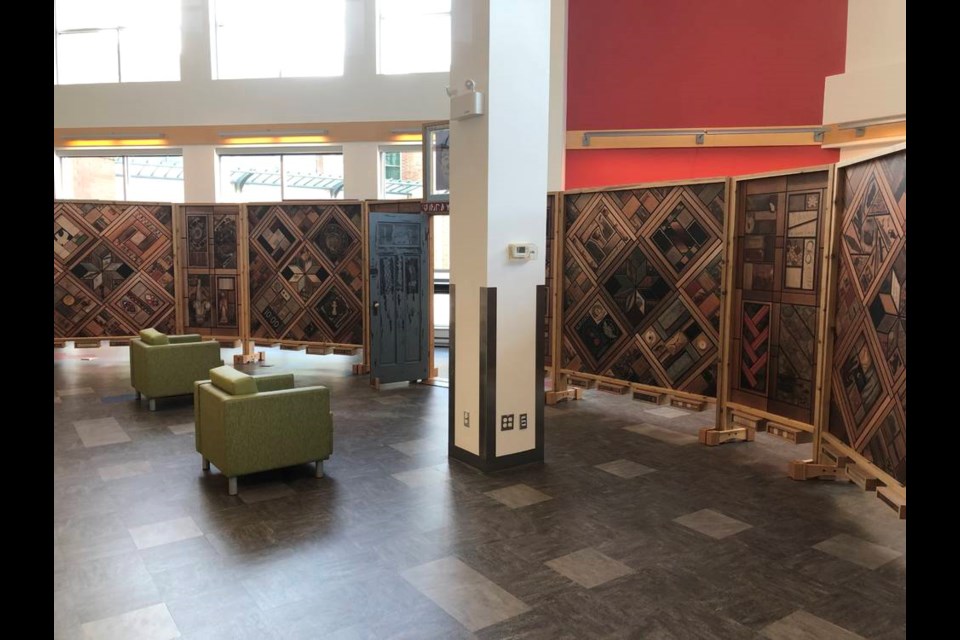 A reproduction of the Witness Blanket, an art installation intended to underline the atrocities of the residential school system, is on display at the Nanaimo harbourfront library until Sept. 30. The original piece is made of hundreds of items reclaimed from communities where there were residential schools. SUBMITTED