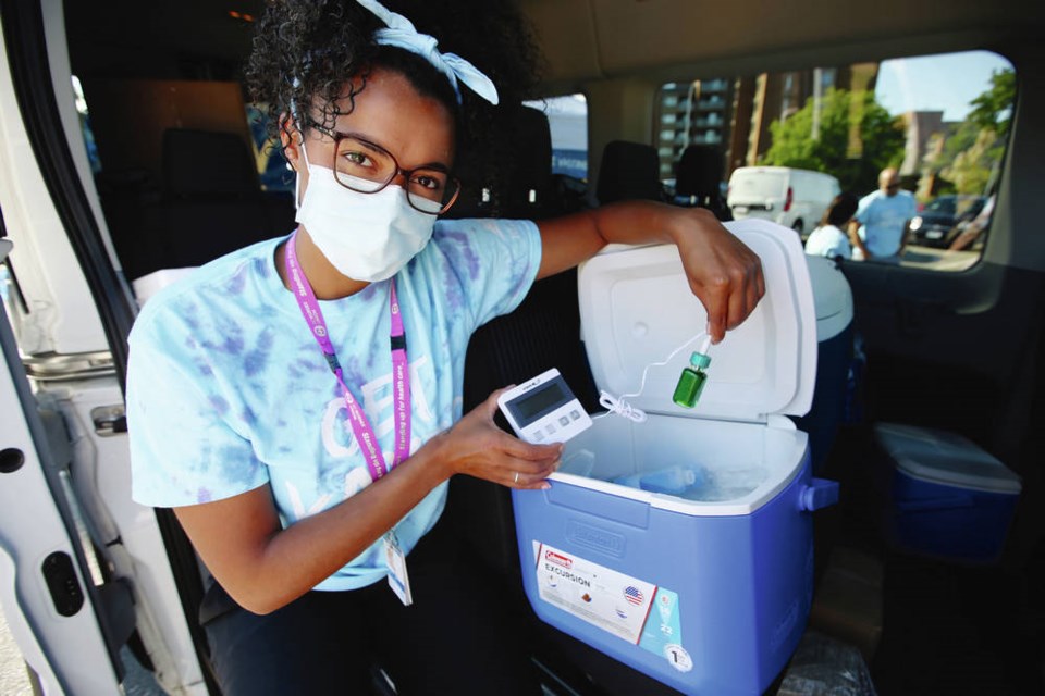 Carlee Bushell shows supplies in the back of Island Healths Vax Van, a mobile COVID-19 immunization clinic that hit the road Thursday to travel to communities across Vancouver Island and deliver doses to those who havent yet received one. ADRIAN LAM, TIMES COLONIST
