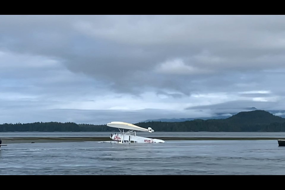 A float plane flipped after hitting a sandbar during takeoff near Tofino on Monday, July 26, 2021. VIA CHEK NEWS