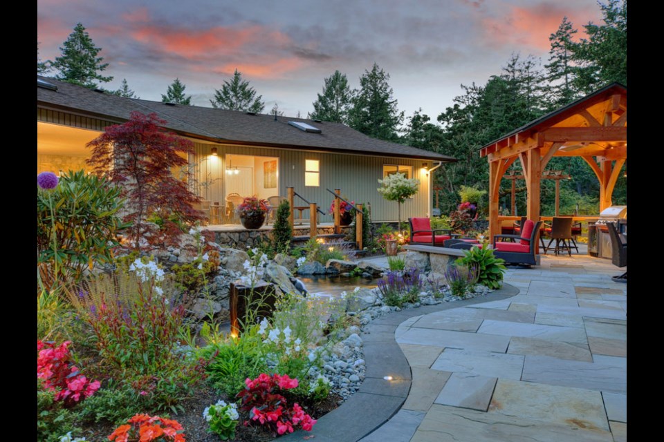 A variety of landscape lighting creates evening ambiance.