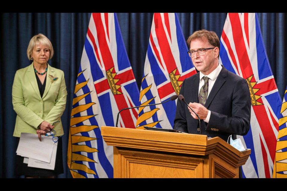 B.C. Health Minister Adrian Dix, with provincial health officer Dr. Bonnie Henry, at a Sept. 7, 2021 news conference announcing the B.C. Vaccine Card. ADRIAN LAM, TIMES COLONIST