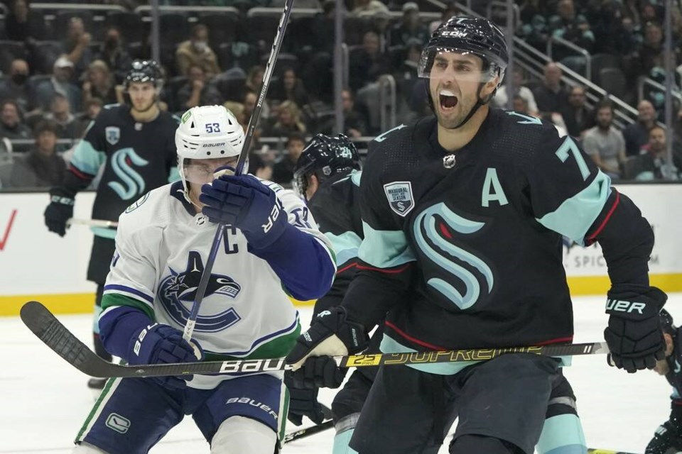 Seattle Kraken right wing Jordan Eberle (7) reacts after Vancouver Canucks center Bo Horvat (53) scored a goal during the second period of an NHL hockey game Saturday, Oct. 23, 2021, in Seattle. (AP Photo/Ted S. Warren)