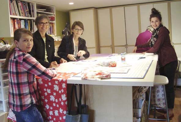 Students at France's Sewing School in Burnaby sewed 30 aprons to be sold at Hats Off Day, raising funds for Burnaby Food First.