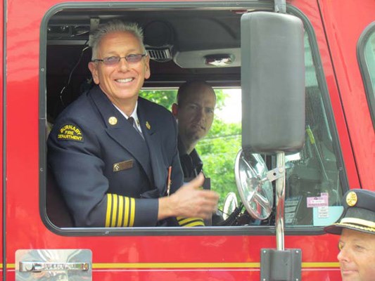 All smiles: Burnaby fire Chief Shaun Redmond was all smiles on Friday, June 21, as he said goodbye to the department he worked for since he was 22 years old. The Burnaby department held a walkout ceremony for the outgoing chief.