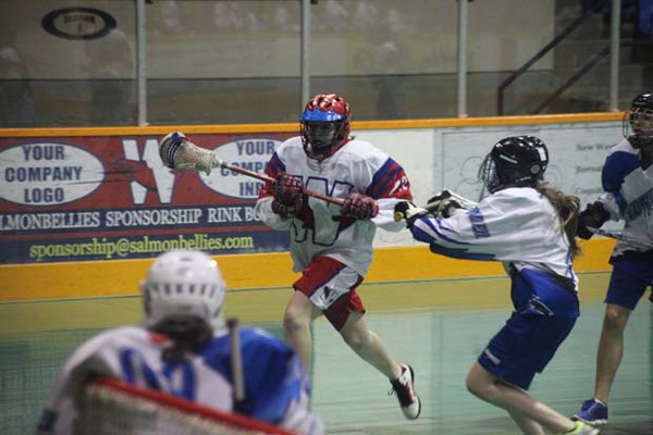 In tight company: The New Westminster Salmonbellies doubled the Langley Thunder 4-2 in bantam girls' lacrosse at the Dorothy Robertson Memorial Tournament at Queen's Park Arena on Saturday.