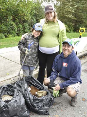 Olivia Marstaeller, along with Jennifer and Ryan Kuba, worked hard during the Great Canadian Shoreline Cleanup in Queensborough on Sept. 25.
