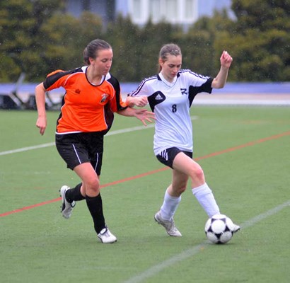 Sidelines: The New Westminster Hyacks, in orange, came back from a one-goal deficit to defeat Burnaby South 3-2 in high school girls' soccer last week. South's Natalie Parsonson, in white, scored a goal in the season opening loss.