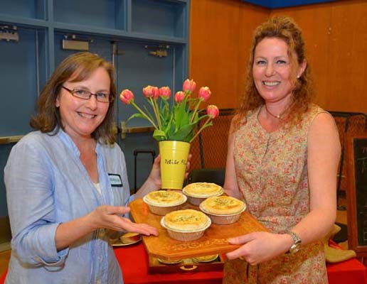 Heidi Clarkson with sister Robyn Murrell with Tourtiere pork pie at the French marketplace.