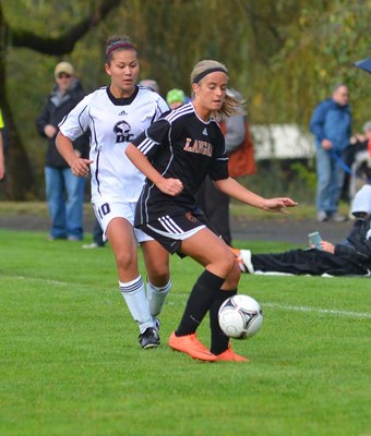 Playoff miss: The Douglas College Royals, in white, missed the PacWest provincial playoffs following last week's back-to-back losses, including a 1-0 loss to Quest and a 4-2 decision to Langara College at BCIT last Sunday.