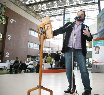 Words, words, words: Reese McBeth reads some of his poetry during Lit Fest New West at Douglas College on Saturday.