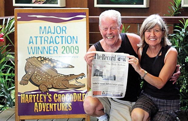 Down Under: Don and Annette Priest took their Record to Australia, where they stopped for a photo at the entrance to Hartleys Crocodile Adventure in Cairns. They had cruised to Australia through the South Pacific islands and then spent 16 days touring eastern Australia.