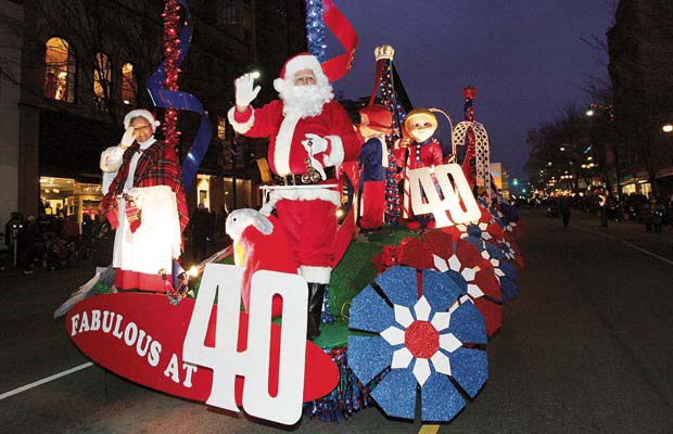 Merry Christmas: Santa and Mrs. Claus appeared on the Hyack Festival Association's float in the 2011 CIBC Christmas Parade of Lights on Dec. 3.