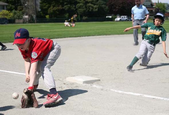 Third again: The New Westminster Twins tied Kerrisdale, in green, 2-2 in this game but went on to win the team's second straight bronze medal at the Hyack Festival major baseball tournament at Moody Park last week.