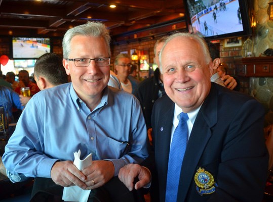 The Uptown Property Group's Bart Slotman, left, poses with New Westminster Mayor Wayne Wright at the River's Reach customer appreciation party.