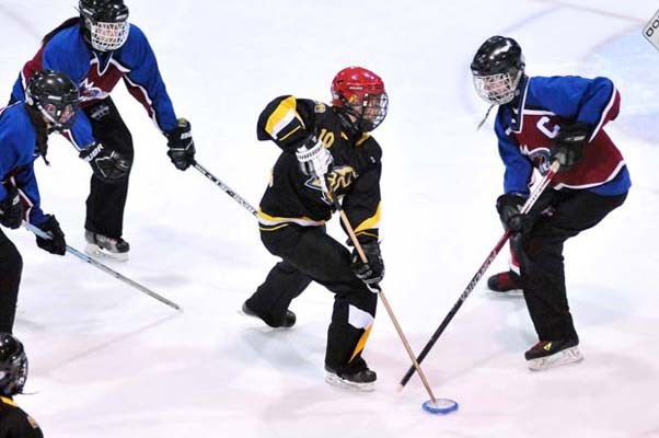 Getting started: The under-19 Burnaby/New Westminster ringette team hosted the Delta Fusion at Queen's Park Arena in an exhibition matchup at last week's Ice Breaker tournament.
