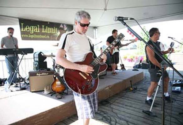 Legal Limit performs at the annual Quayside Boardwalk Festival and Sale on Saturday afternoon.