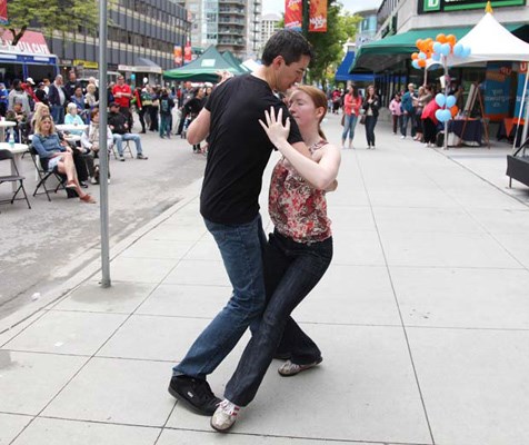Dancing in the streets: James Teshima and Megan Burghall danced near a stage set up outside Royal City Centre at Saturday's Uptown Live event.