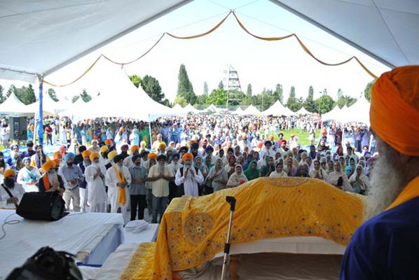 Prayer: The congregation of Sukh Sagar Sikh Temple in Queensborough stands in prayer during the festivities at the seventh annual Nagar Kirtan (religious procession) hosted by the Khalsa Diwan Society in New Westminster.