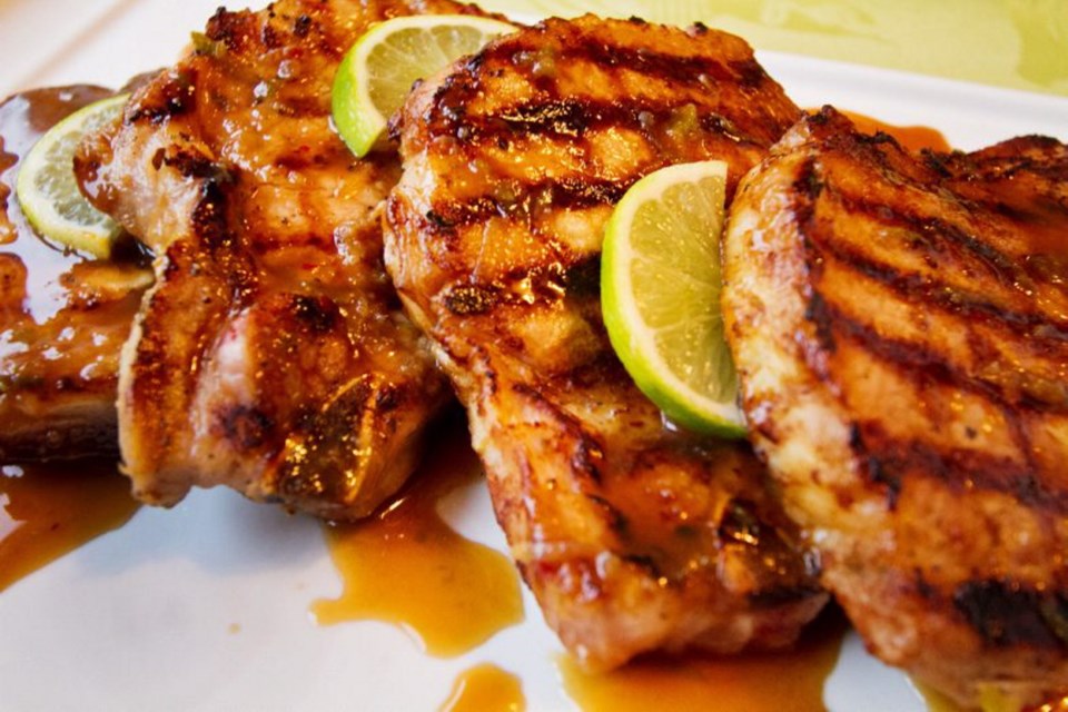 The rum, lime and brown sugar marinade is turned into a glaze for these grilled pork chops.
