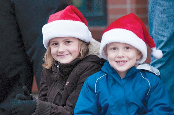 All smiles: Kids of all ages attended the 2012 Parade of Lights on Columbia Street on Dec. 1.