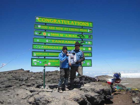 African adventure: Shirley and Peter Anderson took their Record to new heights - to the summit of Kilimanjaro. It's their second time summiting the mountain. They first climbed in 2009 via the Marangu route, but this time they took the longer Lemosho route - seven days and close to 70 kilometres.