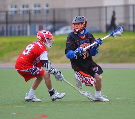 Silver medal: The New Westminster Hyacks, in black in an earlier 9-2 win over Centennial, won a silver medal following a 5-4 overtime loss to Terry Fox in the Tier 1 junior final at the high school field lacrosse championships.