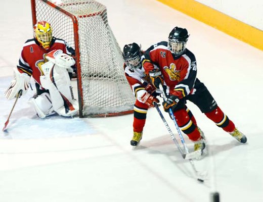 Goal: New Westminster C1's Paul Radnidge, hand raised, watches shot slip past goalie Garrett Cahill and into the net in 7-2 loss in all-New West bronze final.