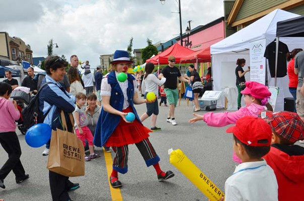 Fun for all ages: Clowns entertain the crowd at the annual Sapperton Day Street Festival on Sunday. People gathered in on East Columbia Street for the annual Sapperton Day Street Festival. There were live street performers, musical groups, bouncy castles, clowns, games, a rock climbing wall, marketplace vendors, a pancake breakfast and much more at the lively celebration, which ran from 11 a.m. to 5 p.m.