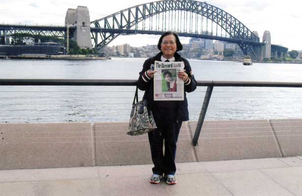 Down Under: Luna Acedillo took her Record to Sydney on a recent trip to Australia. Here, she's at the Sydney Harbour - where, she notes, she climbed the Harbour Bridge, "which was quite an accomplishment for a 70-year-old lady," she writes.