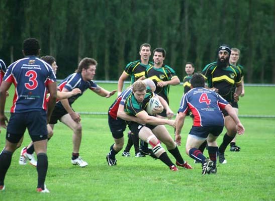 League rules: The Surrey Beavers, in green, take on the Kelowna Owls in the Rugby League Grand Final at Burnaby Sports Complex-East on Saturday.