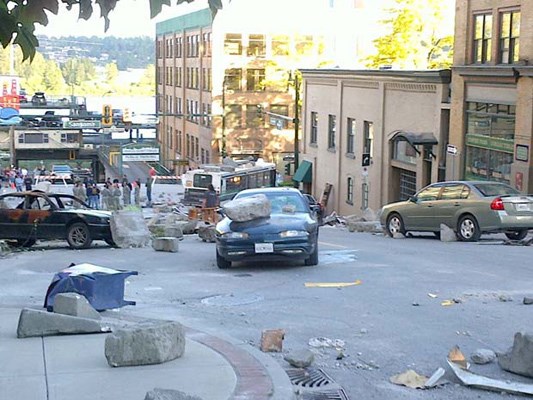 Monster mayhem: Godzilla is in town - filmmakers shot scenes for the movie in downtown New Westminster. City Coun. Jonathan Cote took pictures of the filming, which was happening just out front his downtown condo, located near Columbia and Sixth streets.