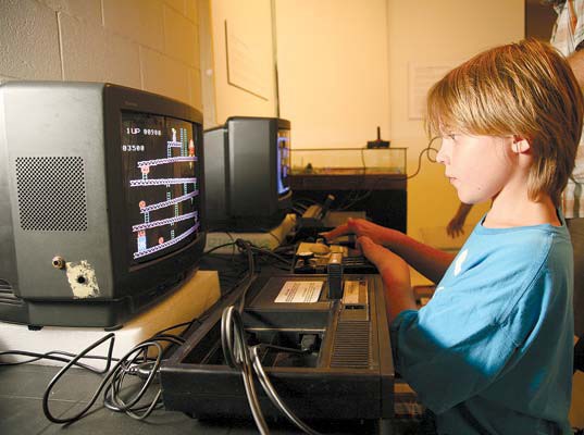 Retro game day: Holden Watkins played Donkey Kong at the video play day at the New Westminster Museum on Aug. 11. It was part of the Pong to Pokemon: History of Video Games in B.C. exhibit, which runs until Oct. 14. The exhibit traces the global history of video games and highlights the world of video game hardware and software made in B.C.