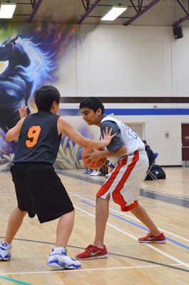 A tall order: Harman Sandhu scored a double-double to lead the New Westminster Hyacks to a 48-23 win over the Cariboo Hill Chargers in district high school bantam boys' basketball on Tuesday. Sandhu scored 12 points and added 10 rebounds, while Angelo Mendoza led all Hyacks with 13 points.