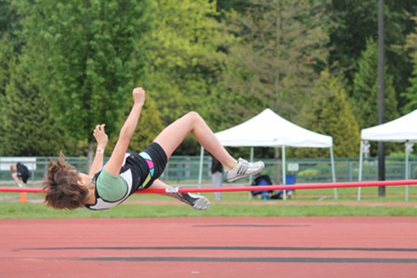 Shianne Lowka shows off her gold-medal leap in the high jump.