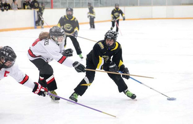 Taking a shot: Burnaby/New Westminster lost to Kelowna in this under-14A ringette game at the association's annual Ice Breaker tournament last week.