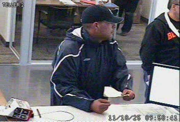 Bank robbery: New Westminster police are looking for this man captured on bank surveillance video following an alleged robbery Tuesday morning.