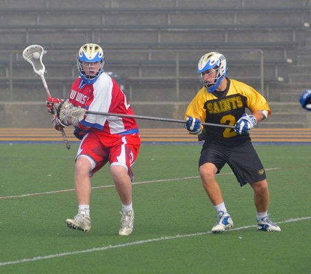 Showdown: The under-16 New Westminster field lacrosse team took on league-leading Port Coquitlam in a Pacific Coast field lacrosse league matchup last Sunday at Mercer Stadium.